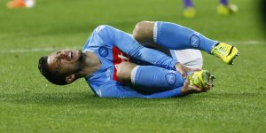 Napoli's Belgian forward Dries Mertens reacts after an injury during the Italian Serie A football match between SSC Napoli and Fiorentina ACF in San Paolo Stadium on March 23, 2014. AFP PHOTO / CARLO HERMANN        (Photo credit should read CARLO HERMANN/AFP/Getty Images)